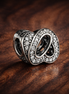Silver Infinity Heart Bead - Silver Infinity Heart Knot Charm — display on walnut