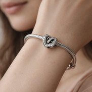 Silver Infinity Heart Bead - Silver Infinity Heart Knot Charm — worn on wrist
