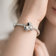 Baby Carriage Charm - Silver Baby Carriage Charm — worn on wrist
