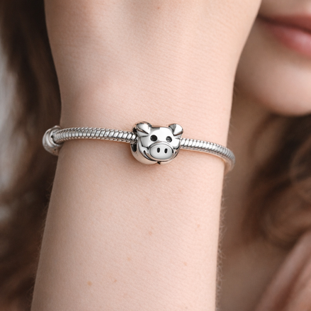 Cow Face Charm - Smiling Cow Face Charm — worn on wrist