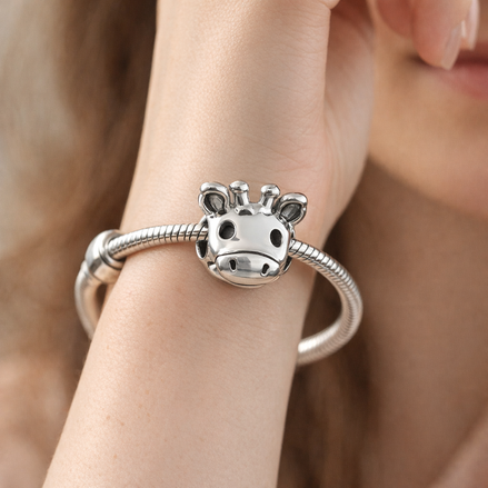 Giraffe Face Charm - Smiling Giraffe Face Charm — worn on wrist