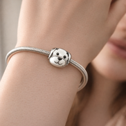 Dog Face Charm - Smiling Dog Face Charm — worn on wrist