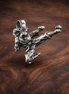 Tiny Branch Bird Charm - Tiny Bird and Branch Charm — display on walnut