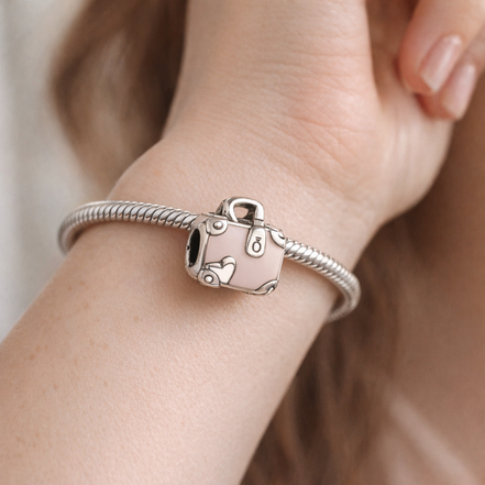 Pink Travel Bag Charm — worn on wrist