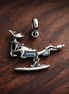 Airplane Travel Charm - Airplane and Airport Travel Charm — display on walnut