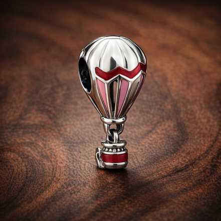 Red Hot Air Balloon Charm - Red and White Hot Air Balloon Charm — display on walnut