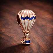 Peach Hot Air Balloon Charm - Peach and Blue Hot Air Balloon Charm — display on walnut
