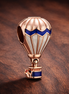 Peach Hot Air Balloon Charm - Peach and Blue Hot Air Balloon Charm — display on walnut