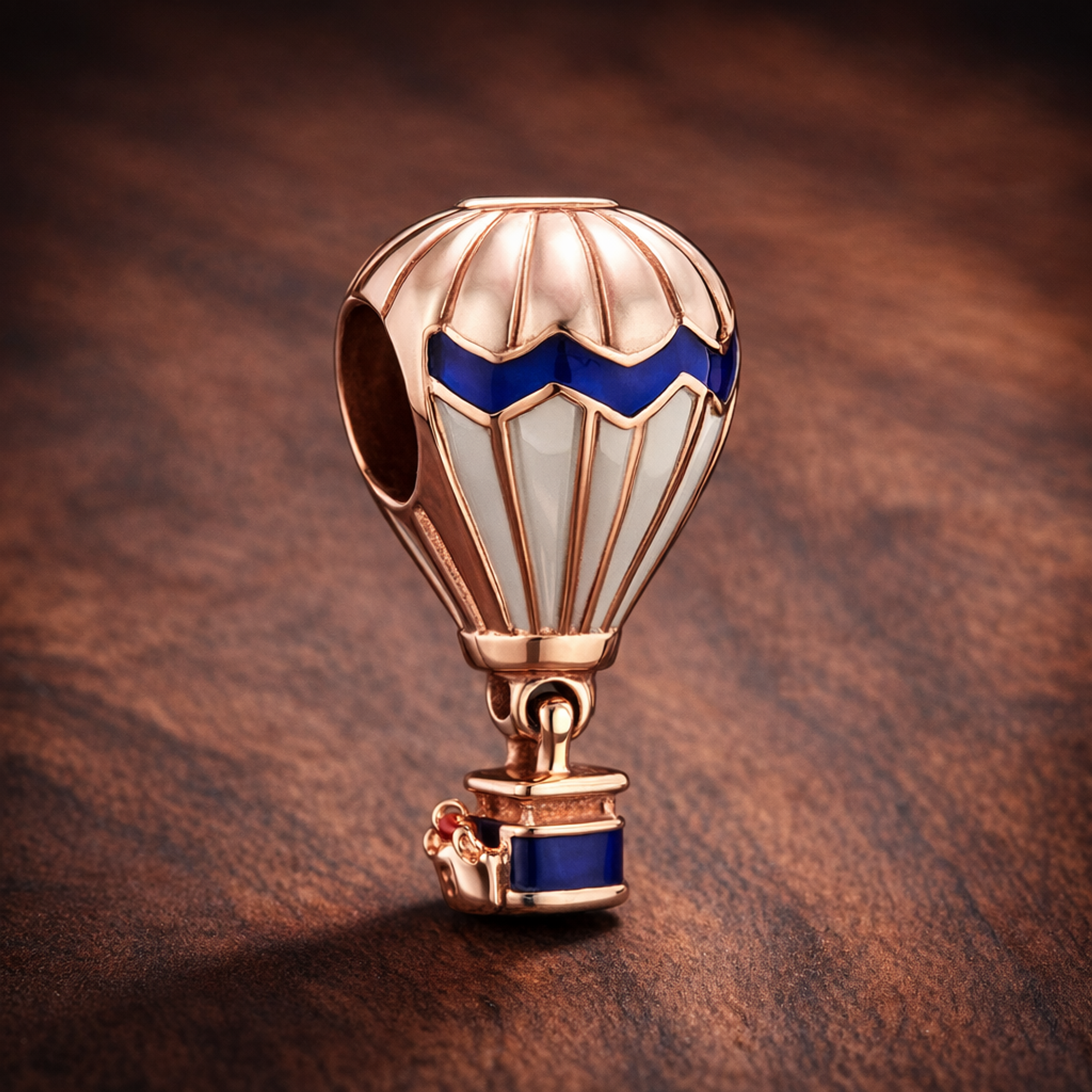 Peach Hot Air Balloon Charm - Peach and Blue Hot Air Balloon Charm — display on walnut