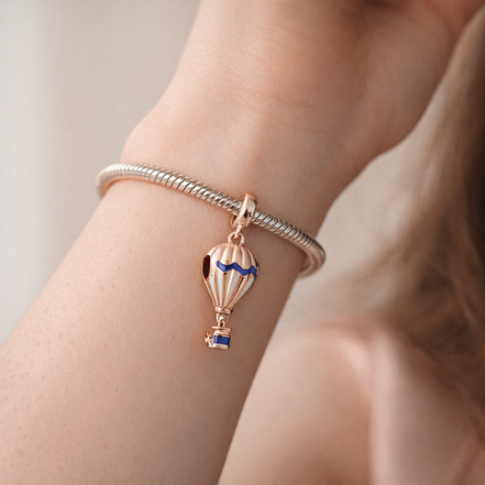Peach Hot Air Balloon Charm - Peach and Blue Hot Air Balloon Charm — worn on wrist