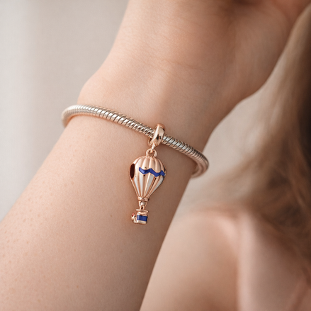 Peach Hot Air Balloon Charm - Peach and Blue Hot Air Balloon Charm — worn on wrist