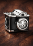 Black Camera Charm - Black Camera Photography Charm — display on walnut
