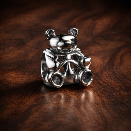 Toy Robot Charm - Smiling Toy Robot Charm — display on walnut