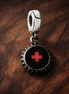 Nurse Dangle Charm — display on walnut