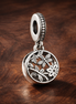 Pearl Shell Charm - Pearl and Shell Floral Dangle Charm — display on walnut