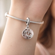 Pearl Shell Charm - Pearl and Shell Floral Dangle Charm — worn on wrist