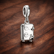 Suitcase Charm - Smiling Suitcase Travel Charm — display on walnut