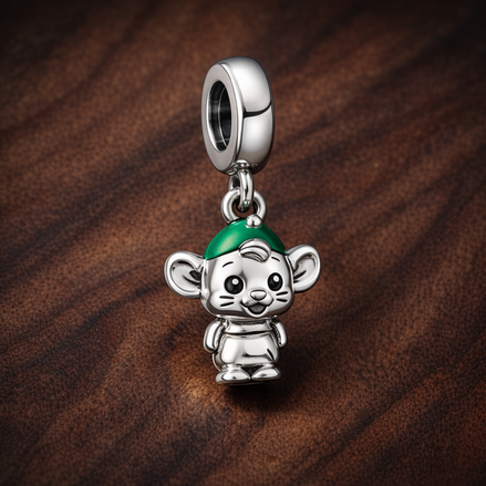 Monkey Elf Charm - Tiny Monkey with Green Hat Charm — display on walnut