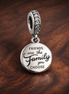 Friends Are Family Dangle Charm — display on walnut