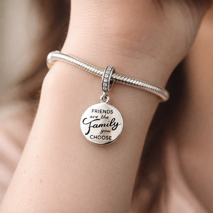 Friends Are Family Dangle Charm — worn on wrist