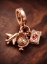 World Travel Charm - Airplane Globe and Passport Charm — display on walnut