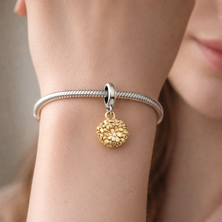 My Pandora Two-tone Daisy Double Dangle Charm — worn on wrist