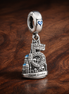 Castle Landmark Charm - Fairytale Castle Landmark Charm — display on walnut