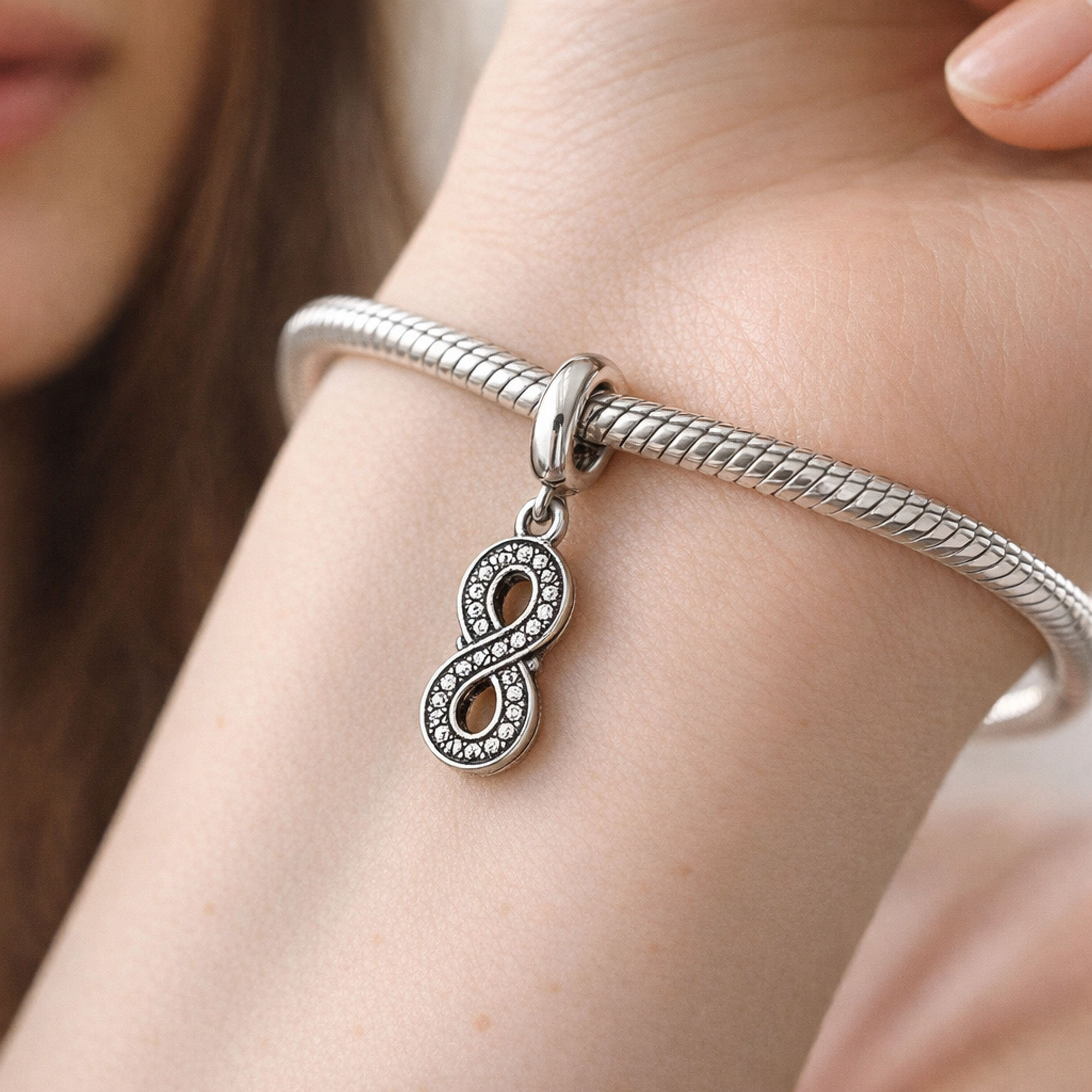 Infinity Charm - Sparkling Infinity Dangle Charm — worn on wrist