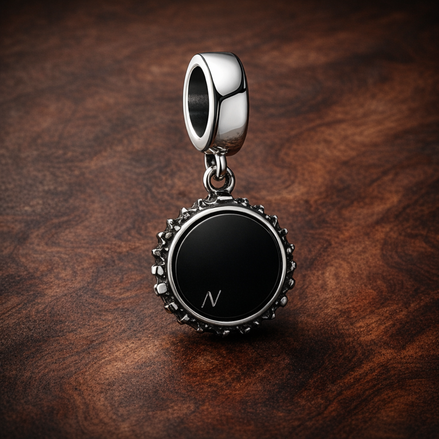 Icon Dangle Charm — display on walnut