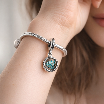 Turquoise Floral Charm - Turquoise Flower Medallion Charm — worn on wrist