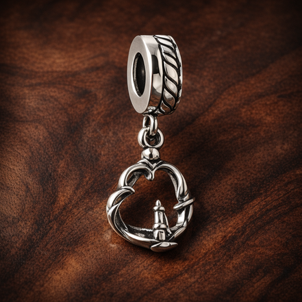 Pretzel Dangle Charm — display on walnut