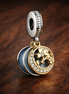 Celestial Disc Charm - Blue and Gold Plated Celestial Disc Charm — display on walnut