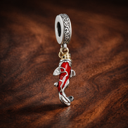 Koi Fish Charm - Red Koi Fish Dangle Charm — display on walnut