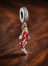 Koi Fish Charm - Red Koi Fish Dangle Charm — display on walnut