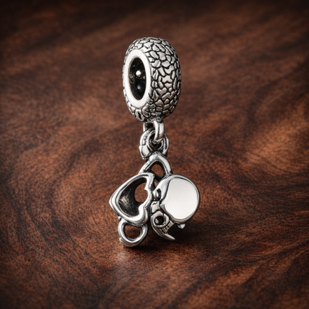White Flower Charm - White Open Petal Flower Charm — display on walnut