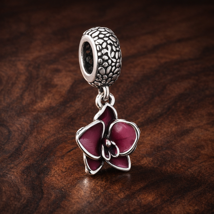 Pink Flower Charm - Pink Enamel Flower Dangle Charm — display on walnut