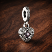 Open Heart Charm - Ornate Open Heart Dangle Charm — display on walnut