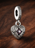 Open Heart Charm - Ornate Open Heart Dangle Charm — display on walnut