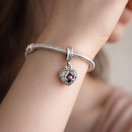 Open Heart Charm - Ornate Open Heart Dangle Charm — worn on wrist