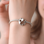 Paw Print Charm - Silver Paw Print Charm — worn on wrist