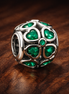 Green Heart Mosaic Charm - Green Heart Cutout Mosaic Charm — display on walnut