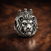 Lion Head Charm - Crowned Lion Head Charm — display on walnut