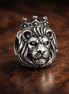 Lion Head Charm - Crowned Lion Head Charm — display on walnut