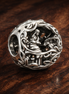 Alice Tea Party Bead - Alice Tea Party Storybook Charm — display on walnut