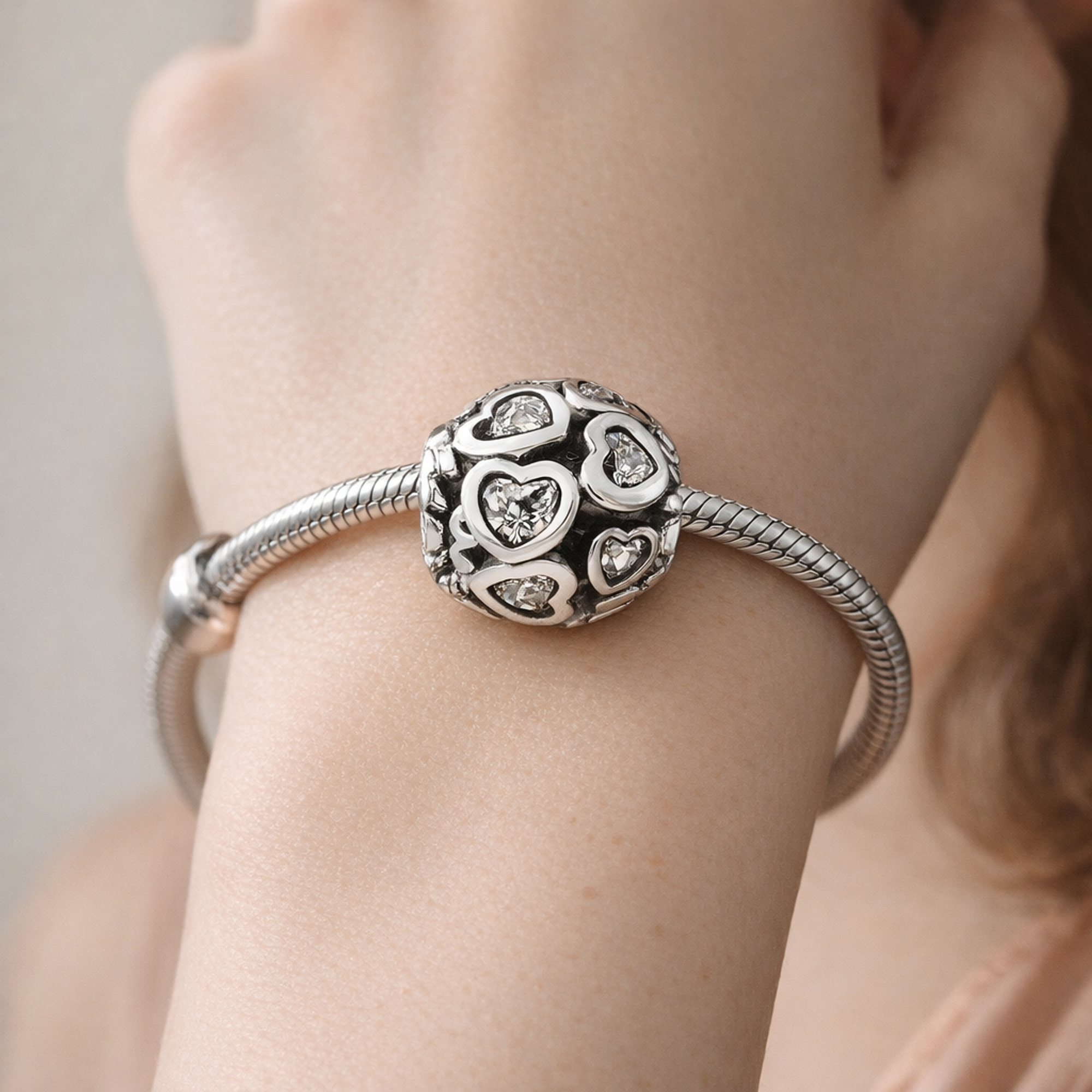Black Heart Logo Charm - Black and Silver Heart Logo Bead Charm — worn on wrist