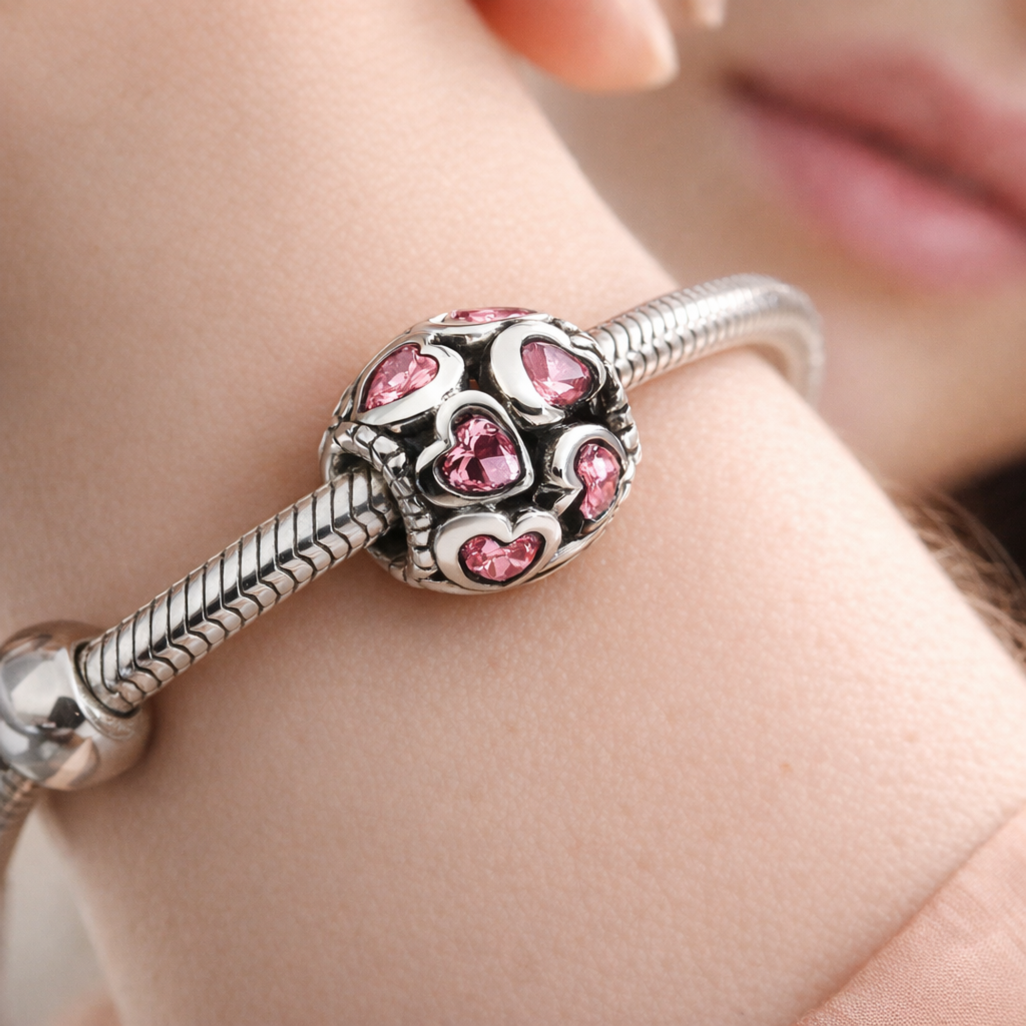 Pink Heart PavÃ© Charm - Pink Heart PavÃ© Bead Charm — worn on wrist