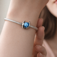 Blue Birthstone Spacer - Blue Stone Smile Spacer Charm — worn on wrist
