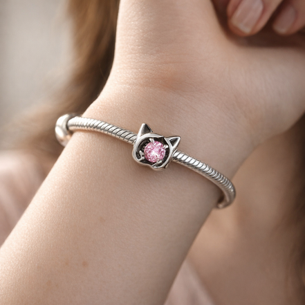 Pink Birthstone Spacer - Pink Stone Smile Spacer Charm — worn on wrist