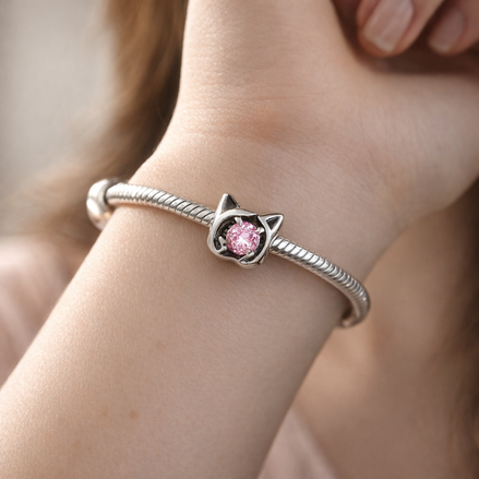 Pink Birthstone Spacer - Pink Stone Smile Spacer Charm — worn on wrist