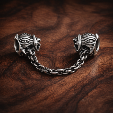 Safety Chain Charm - Silver Safety Chain with Wing Ends — display on walnut